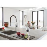 Mitigeur Grohe 30 294 dc0 Essence + pomme de douche extractible super acier - Image 3