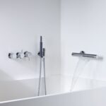 Pommeau de douche Vola Combi-34 à effet cascade avec mitigeur thermostatique et douchette à main